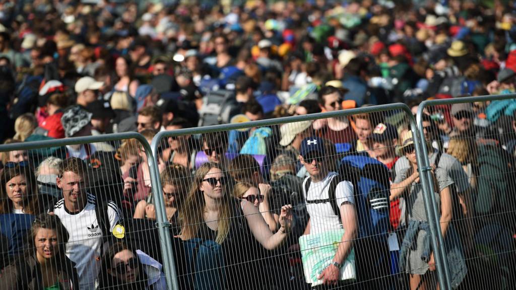 Revellers arrive to attend the Glastonbury Festival