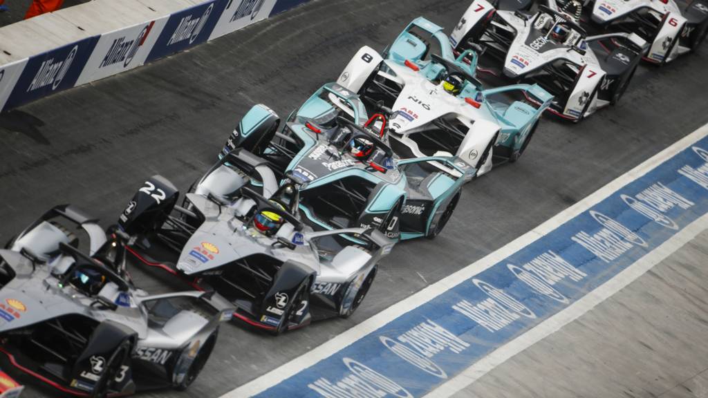 Formula E cars in the pit lane