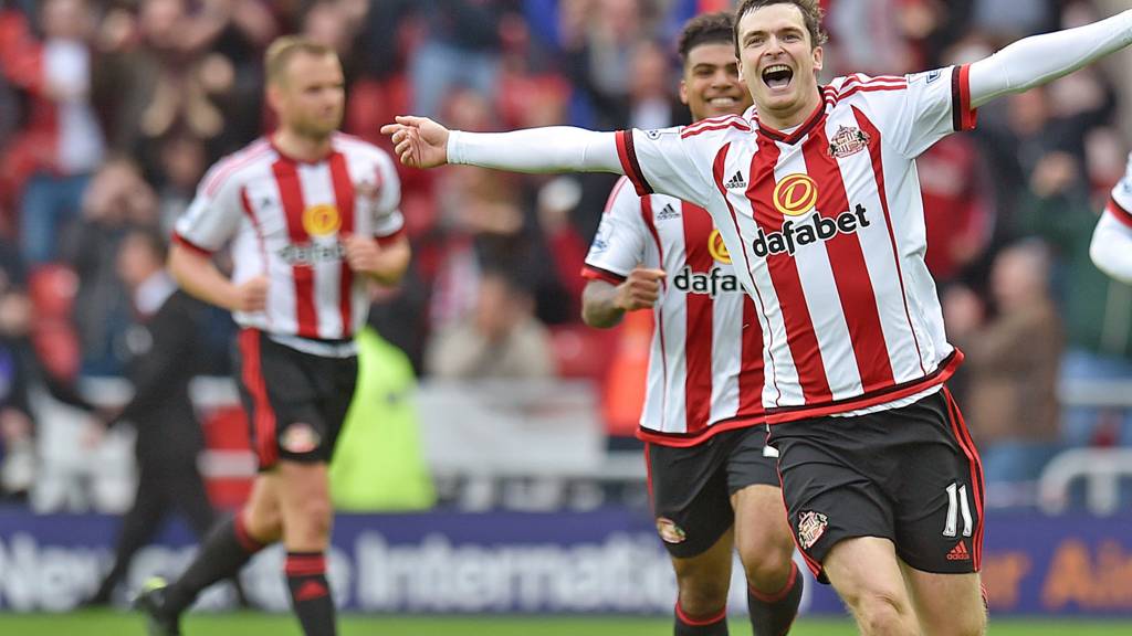 Adam Johnson celebrates