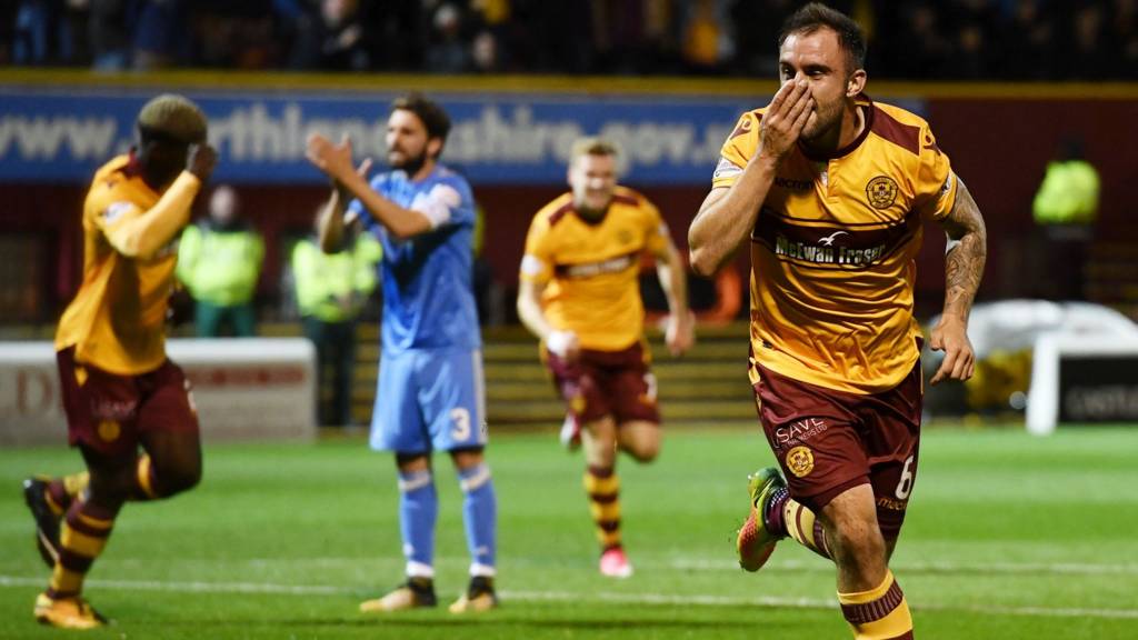 Peter Hartley celebrates