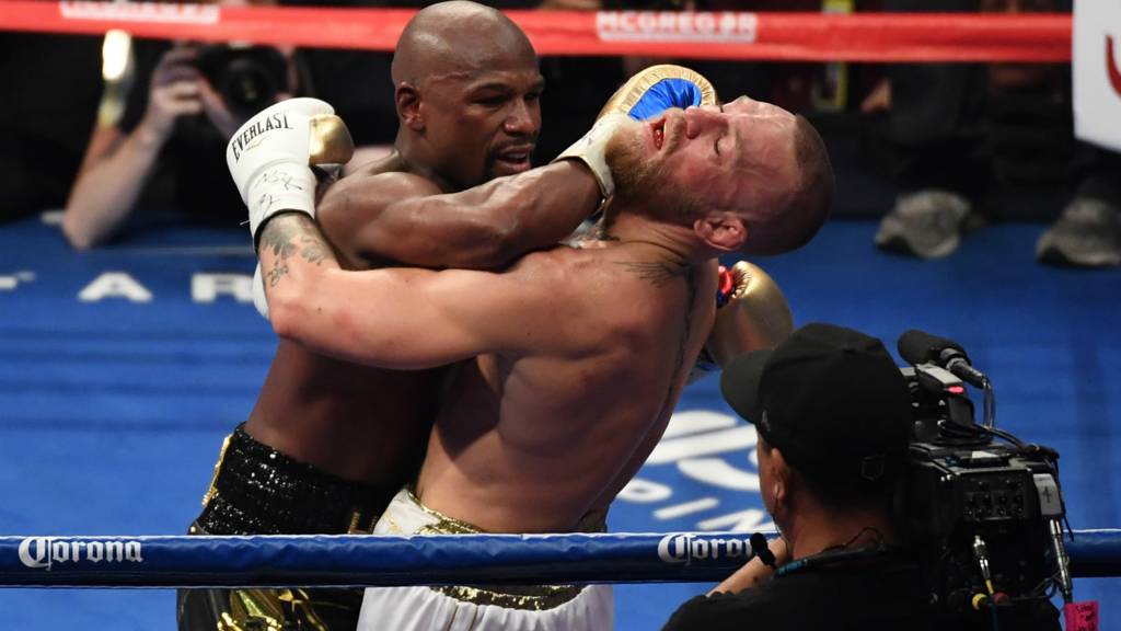 Mayweather lands a hit on McGregor