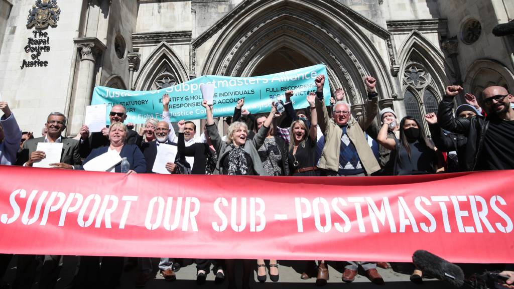 Sub-postmasters celebrating their overturned convictions, Royal Courts: Post Office horizon scandal Former post office workers celebrate outside the Royal Courts of Justice, London