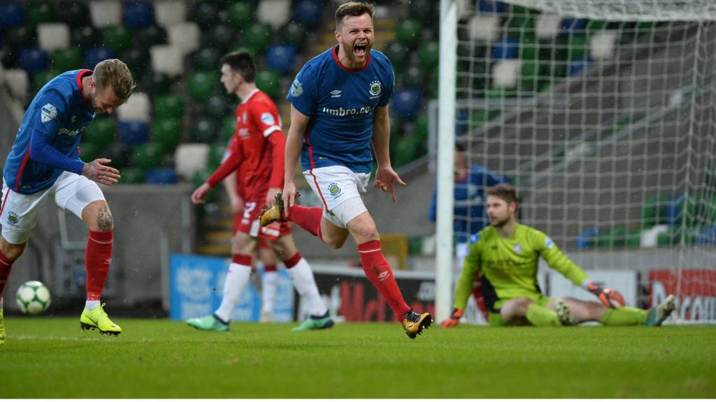 Niall Quinn celebrates scoring for Linfield