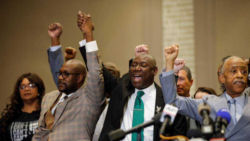 From left to right: George Floyd's brother Philonise, attorney Ben Crump and Reverend Al Sharpton react to the jury verdict in Minneapolis, Minnesota. Photo: 20 April 2021