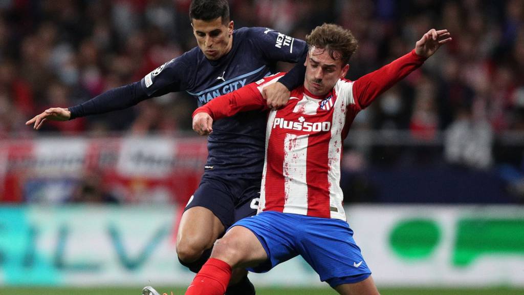 Joao Cancelo (left) and Antoine Griezmann (right)