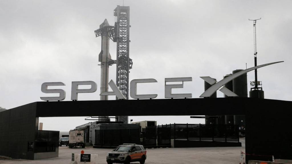 SpaceX's Starship spacecraft is seen atop its powerful Super Heavy rocket at the company's Boca Chica launchpad