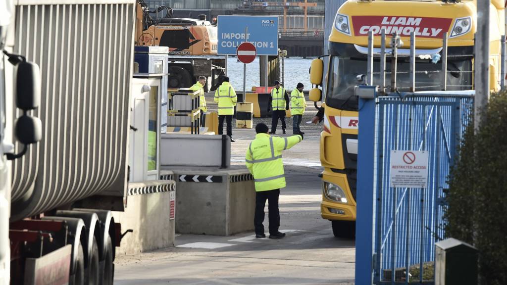 DAERA port inspection staff are seen watching freight exiting the Cairnryan to Larne ferry on February 10, 2021 in Larne, Northern Ireland.