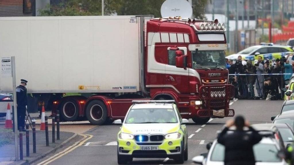Lorry container being moved under police escort