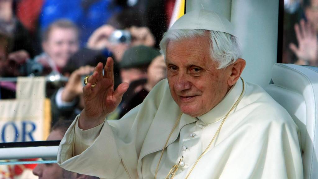 Benedict XVI waves to crowds in the UK in 2010