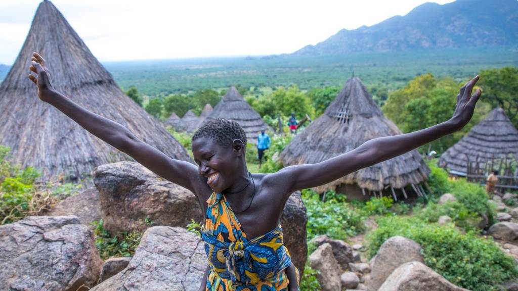 Lotuko woman performing a welcome dance, Central Equatoria, Illeu, South Sudan on November 21, 2019