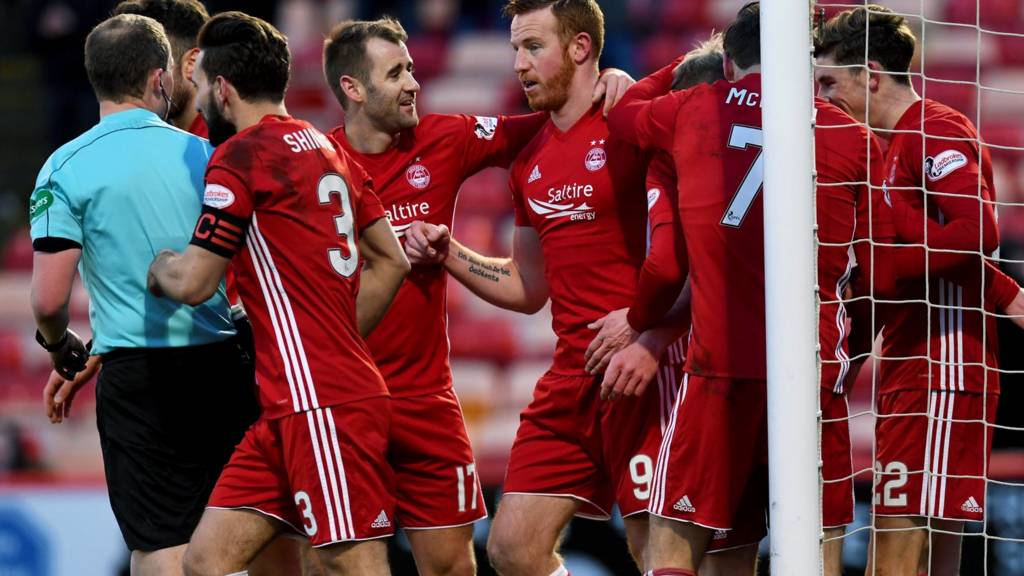 Aberdeen celebrate Adam Rooney's opening goal