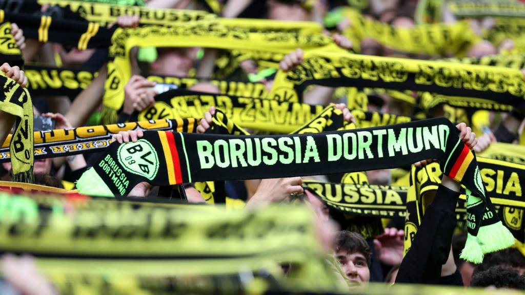 Borussia Dortmund fans show their support with scarfs