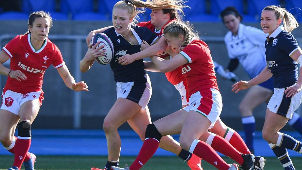 Scotland's Megan Gaffney is tackled by Georgia Evans of Wales