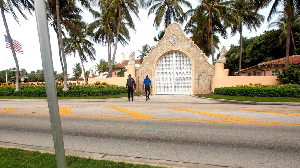 Security guards walk outside Mar-a-Lago