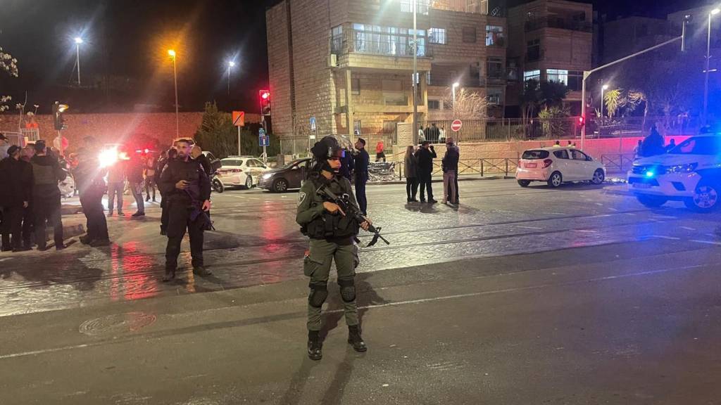 Emergency services work at the scene of a shooting at a synagogue in Neve Yaakov area of Jerusalem, Israel, 27 January 2023. According to a police spokesperson, at least eight people were killed and several injured in a shooting attack at a synagogue.