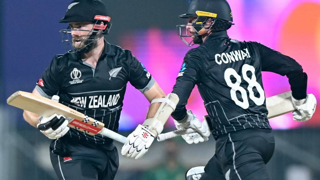 New Zealand's Kane Williamson (left) and Devon Conway (right) run between the wickets