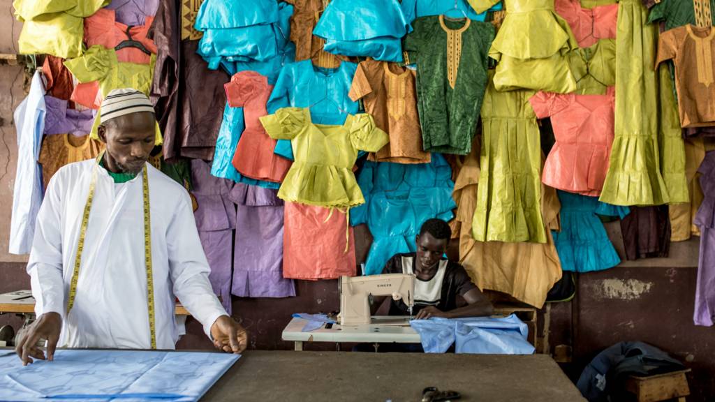 Tailors in a workshop in Banjul, The Gambia - November 2023
