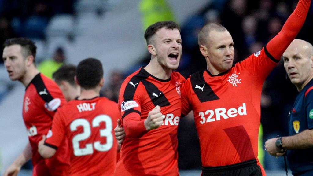 Andy Halliday celebrates with Rangers scorer Kenny Miller