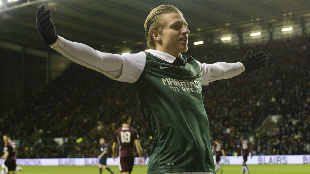 Jason Cummings celebrates firing Hibs in front