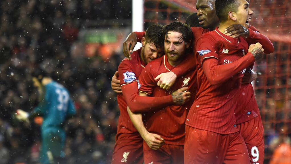 Joe Allen celebrates after scoring for Liverpool