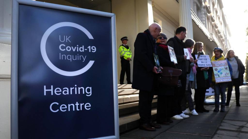 Protesters outside hearing centre