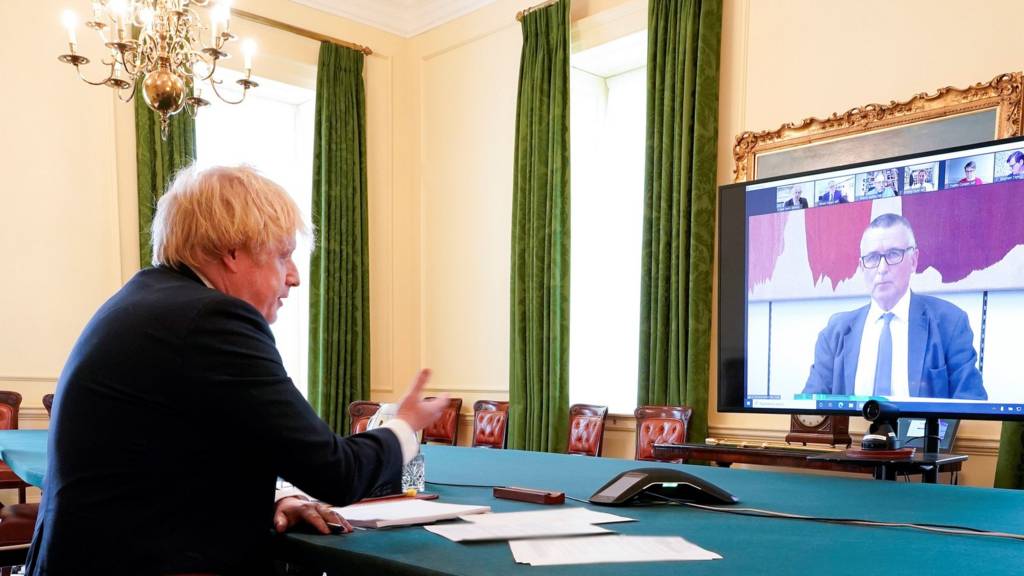 Boris Johnson appears on a video call to answer MPs questions