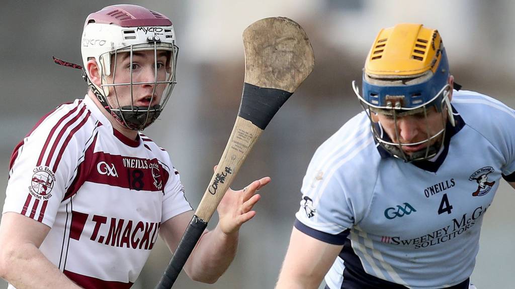 Slaughtneil's Conor McAllister battles with Na Piarsaigh's Niall Buckley