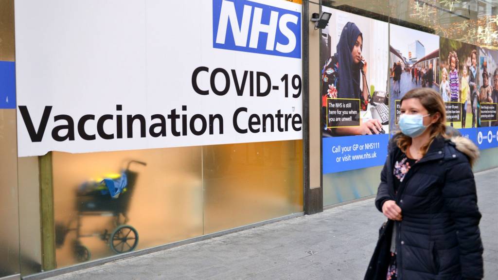 Woman outside a vaccination centre