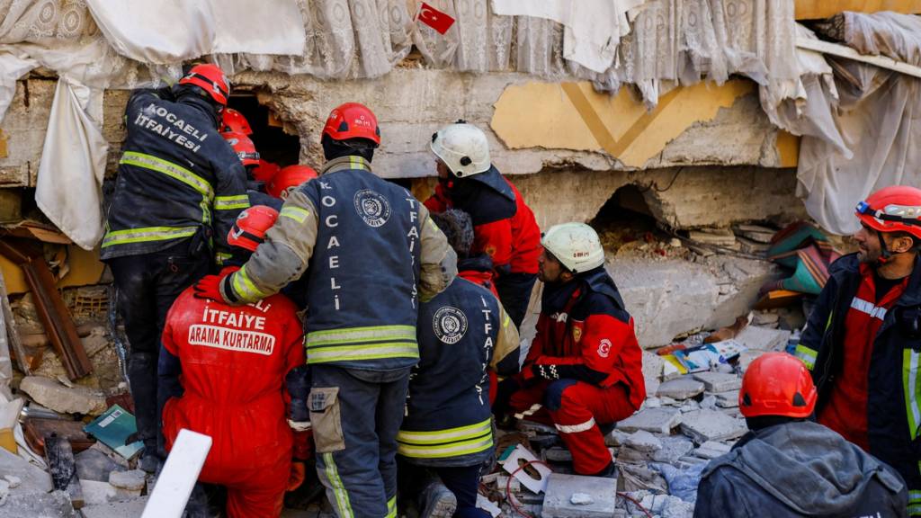 Rescuers work to rescue an 11-year-old boy in Turkey