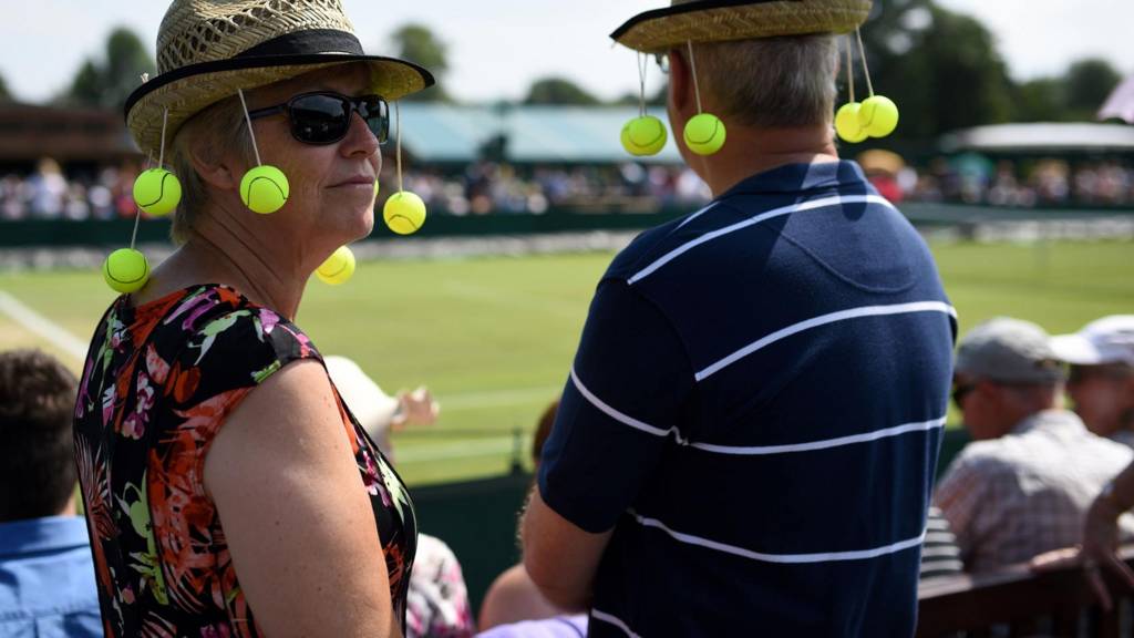 Fans watch play at Wimbledon