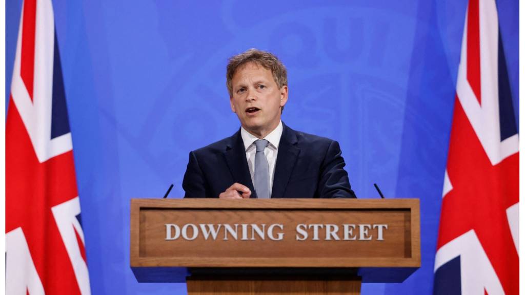 Britain's Transport Secretary Grant Shapps gives a virtual press conference inside the new Downing Street Briefing Room in central London on May 7, 2021.
