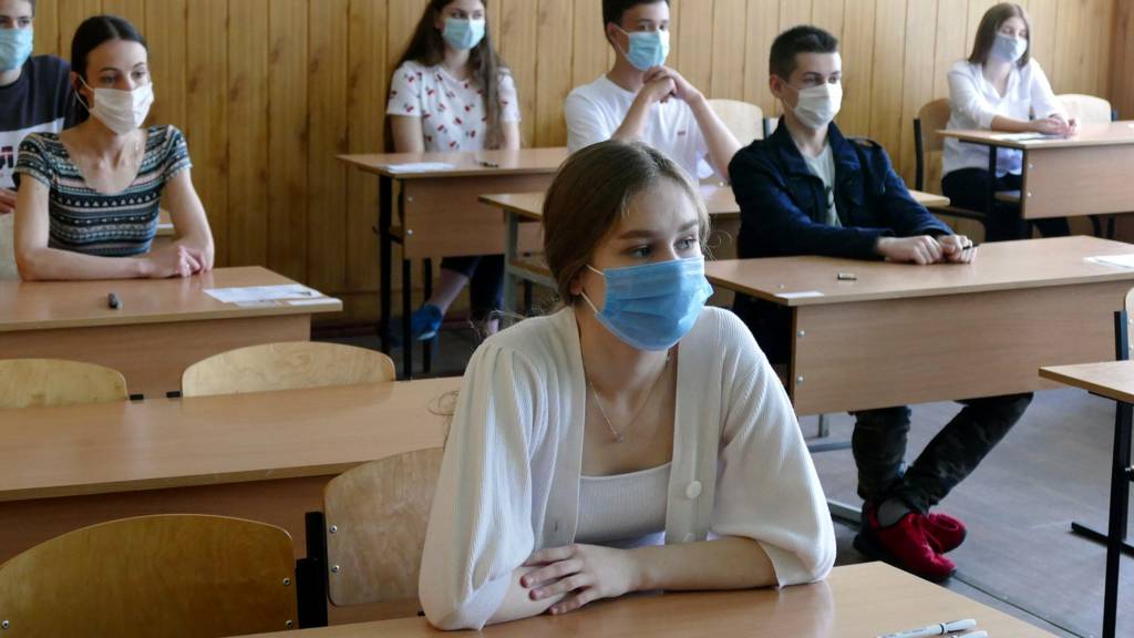 Participants are seen in a classroom in Ukraine
