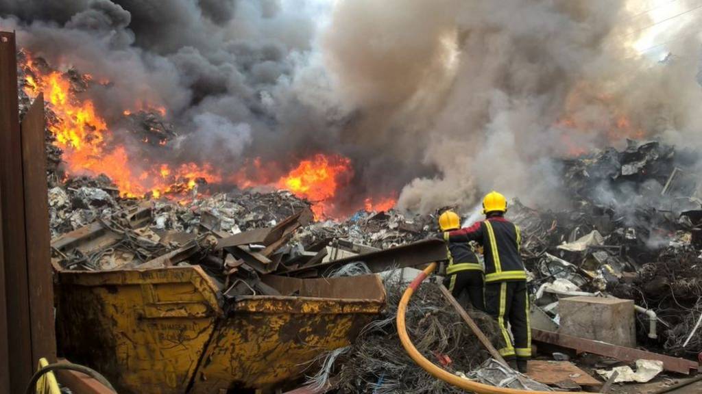 Firefighters at scrapyard blaze