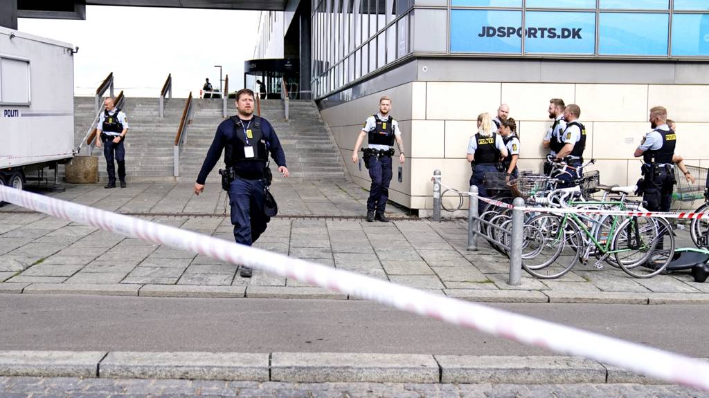 Police officers take part in the investigation at the closed Field's shopping centre on 4 July 2022, a day after a shooting occurred at the mall, in Copenhagen, Denmark