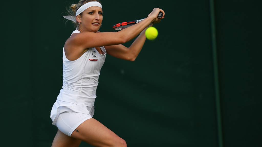 Timea Bacsinszky hits a shot