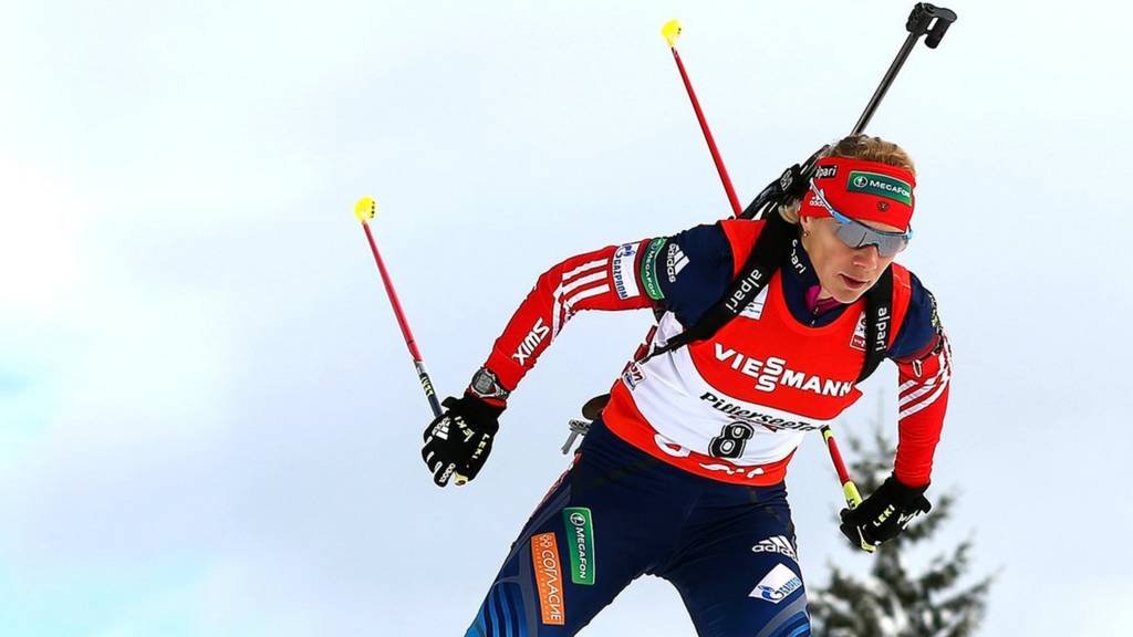 A biathlon competitor in action