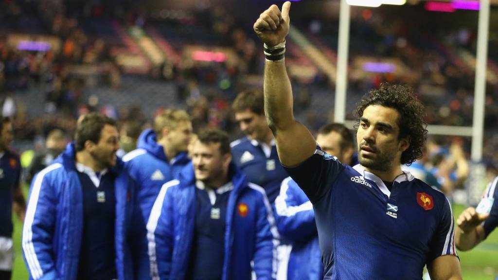 Yoann Huget celebrates a Six Nations victory against Scotland