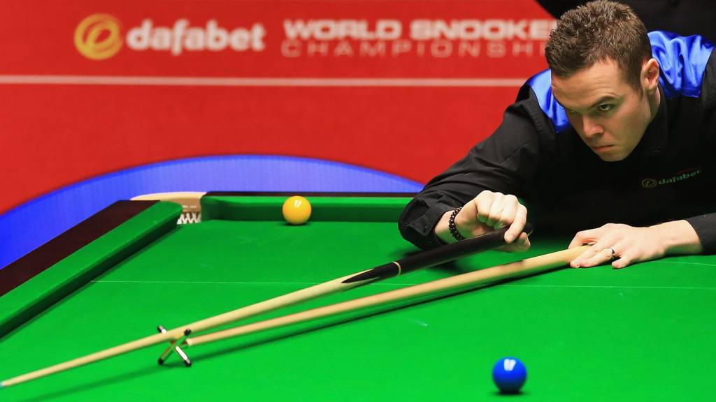 Jamie Cope takes a shot during his first round match against Shaun Murphy