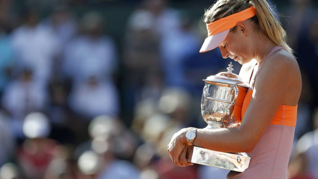 Maria Sharapova of Russia holds the trophy