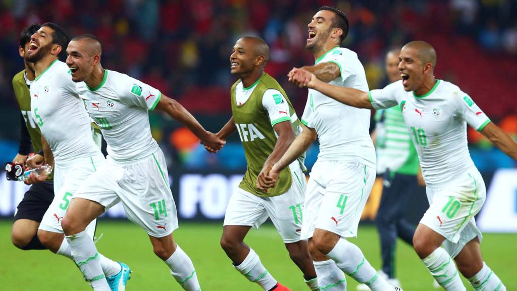 Algerian players celebrate at full time