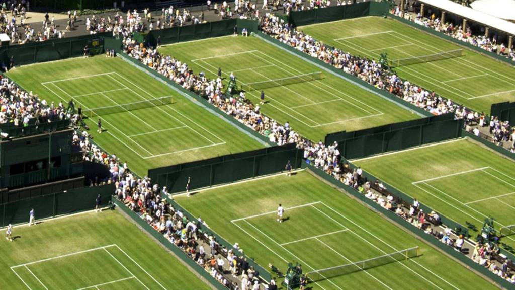 Tennis matches being played at the Wimbledon Championships