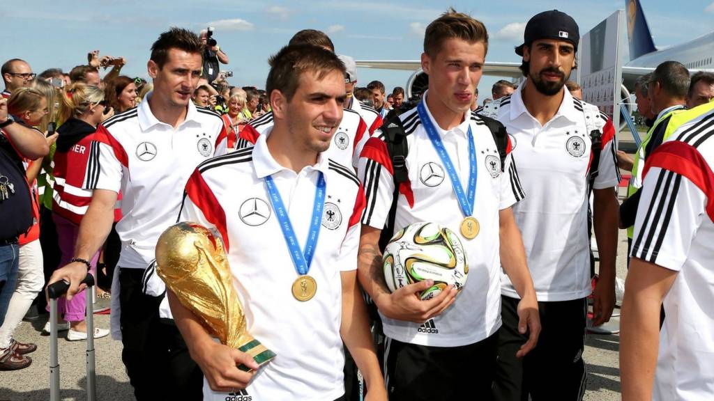 Miroslav Klose, Philipp Lahm, Lars Bender, Sami Khedira and Toni Kroos with the cup