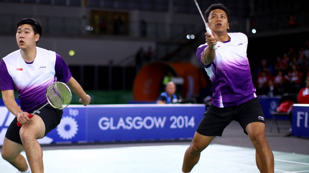 Danny Chrisnanta and Chayut Triyachart of Singapore contest the badminton at Glasgow 2014