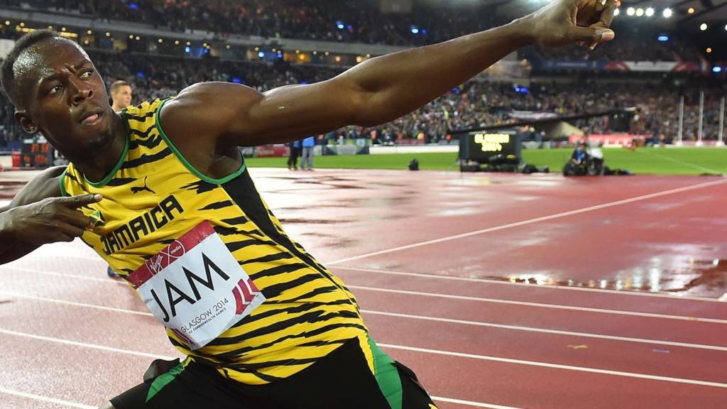 Usain Bolt celebrates Jamaica's relay win