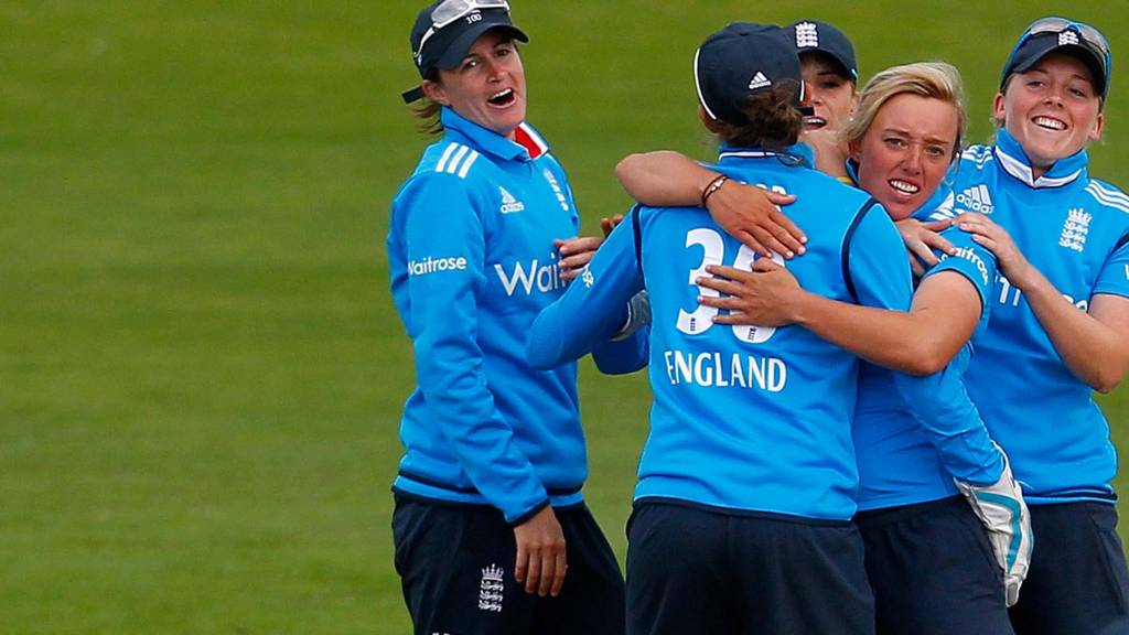Danielle Hazell of England celebrates with team mates