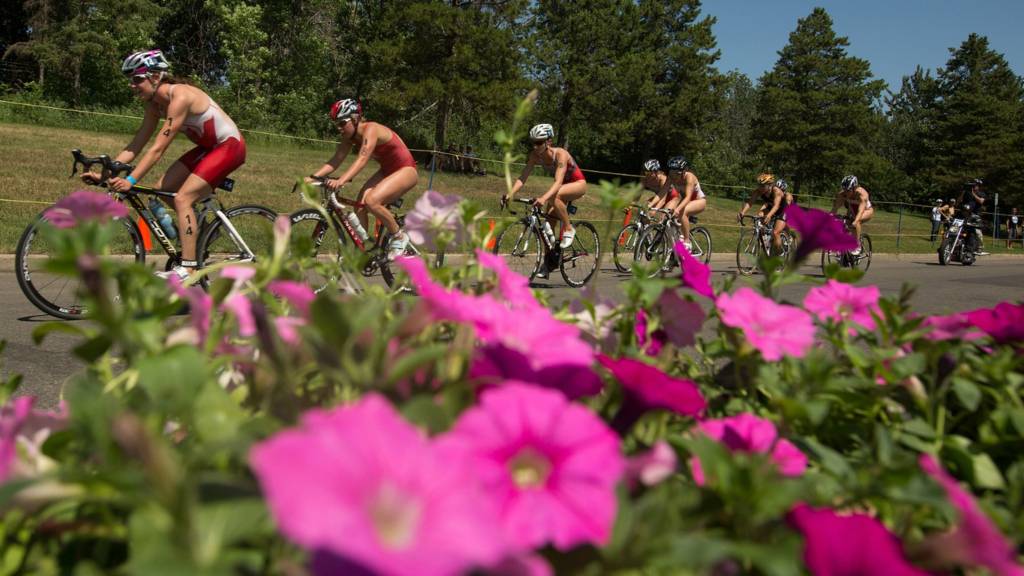 The elite women's field race through William Hawrelak Park at the Edmonton ITU Triathlon World Cup