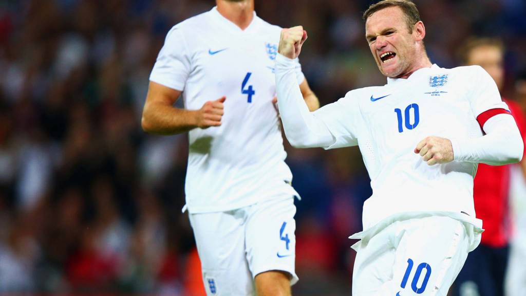 Wayne Rooney of England celebrates after scoring a goal