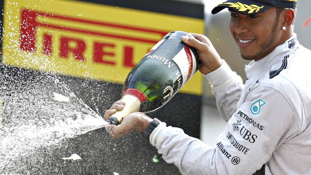 Lewis Hamilton celebrates his win in the Italian Grand-Prix