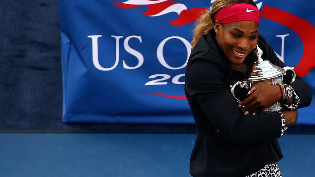 Serena Williams of the United States celebrates with the trophy