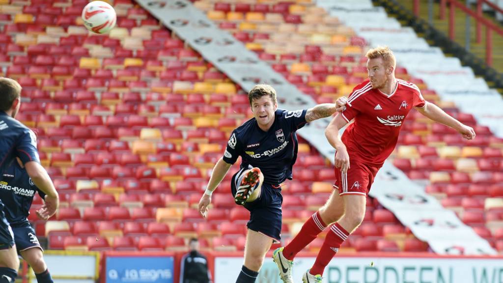 Adam Rooney scores for Aberdeen against Ross County